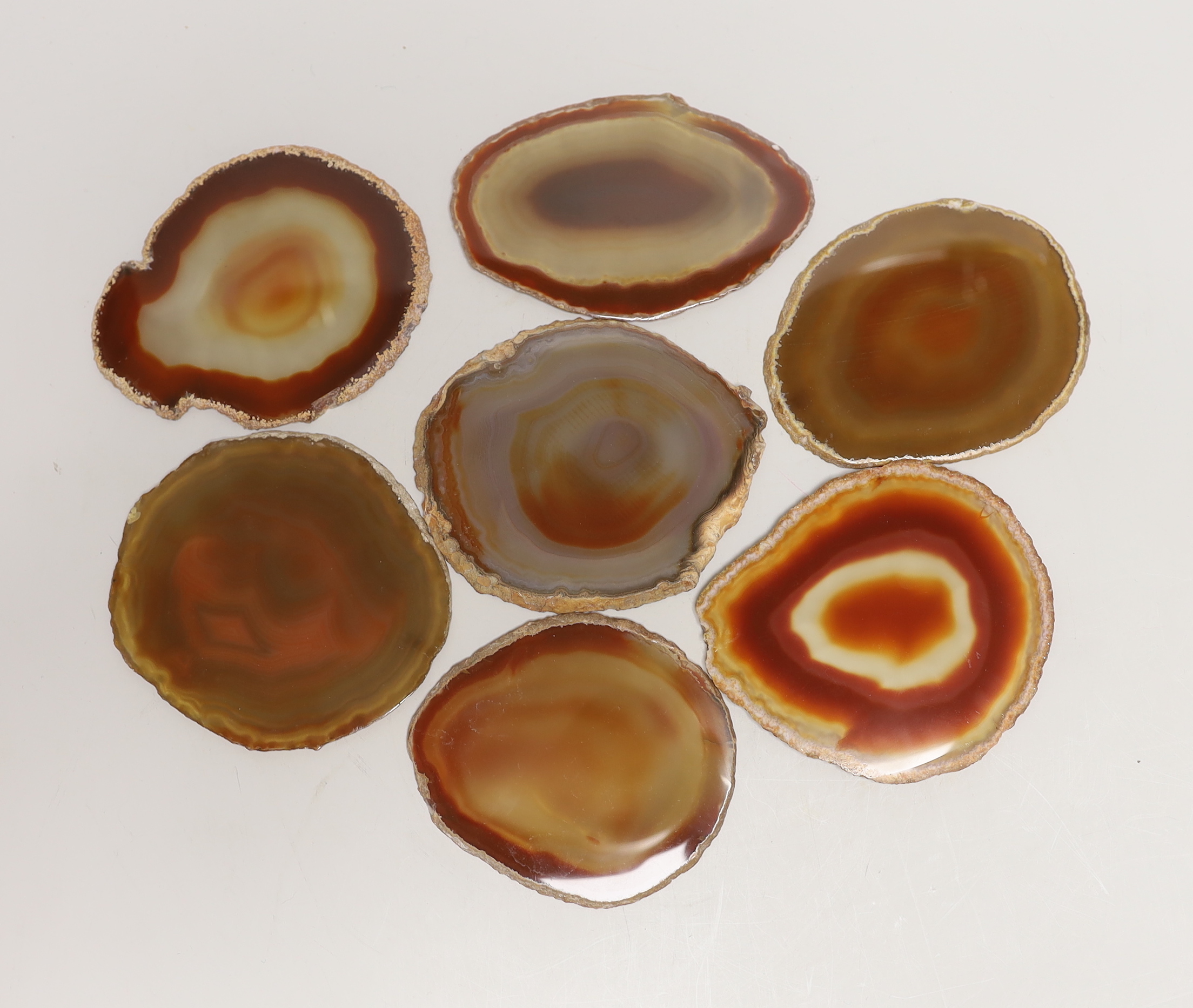 Seven assorted agates.